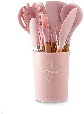 Set utensili da cucina in silicone rosa in contenitore cilindrico