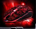 Mouse gaming ottico retroilluminato con motivo rosso su base nera, forma ergonomica