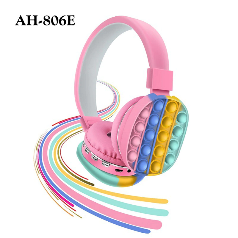 Cuffie Bluetooth per bambini fascia rosa, auricolari grigi e pad silicone arcobaleno