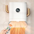 Termoconvettore elettrico a parete bianco con tubi dorati, pannello comandi e telecomando