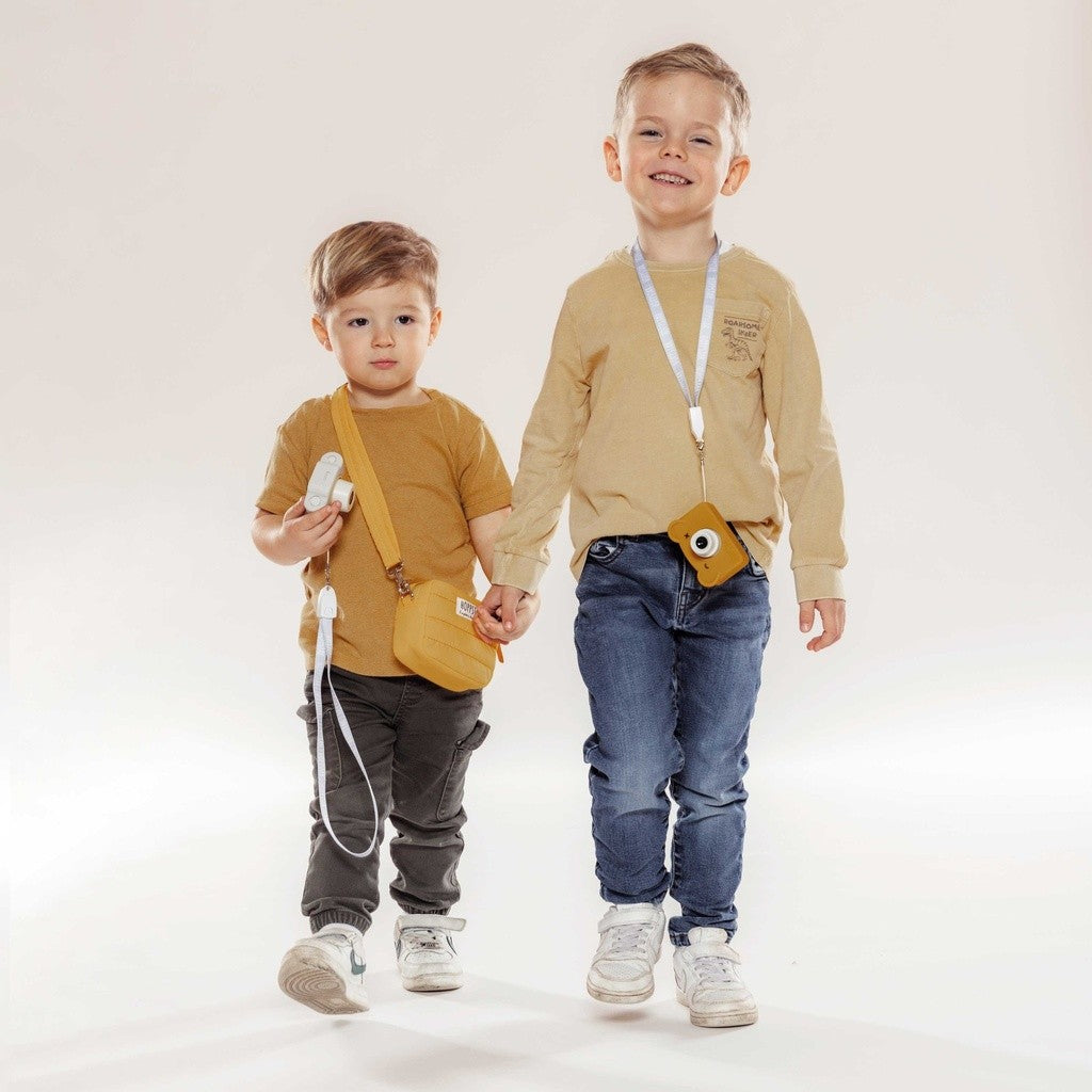 Fotocamera per bambini con tracolla e custodia, vista frontale
