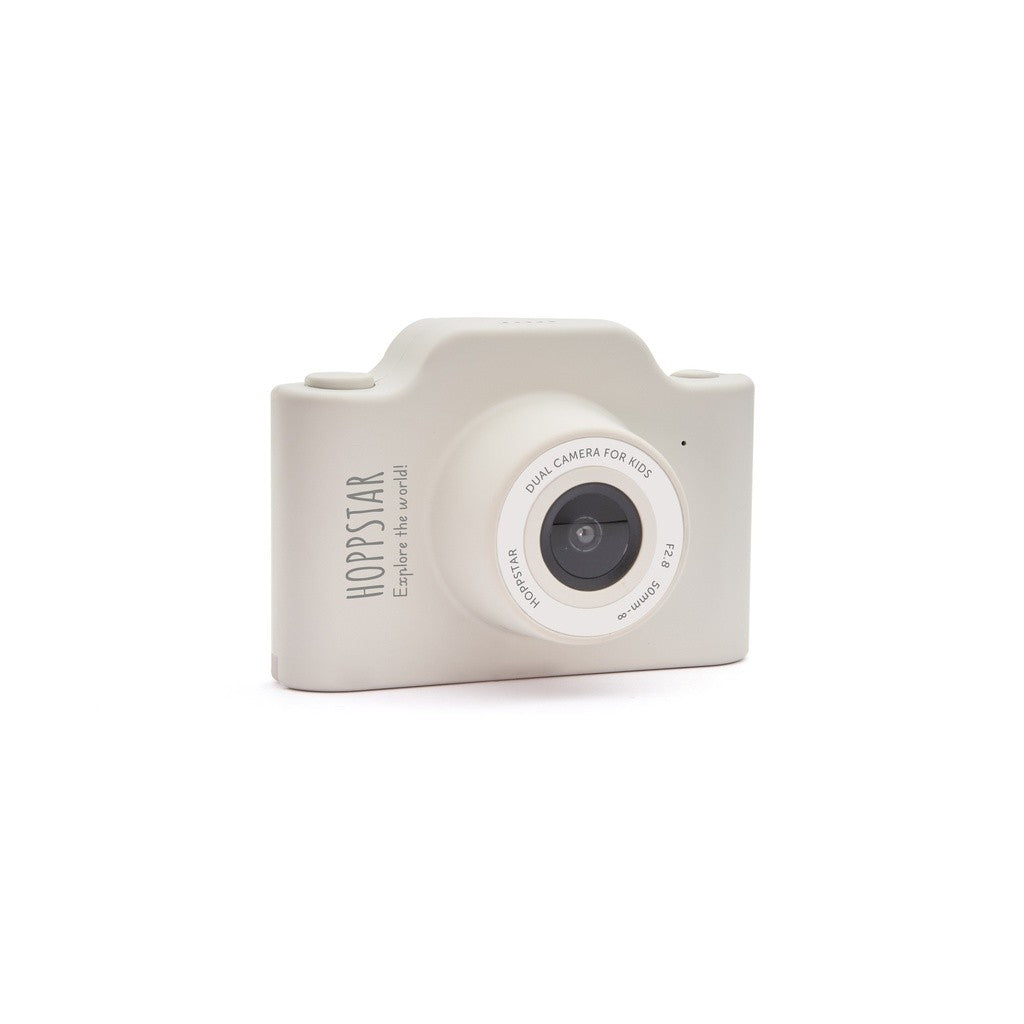 Fotocamera per bambini bianca con obiettivo e comandi laterali
