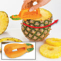 Sbucciatore per ananas arancione applicato su ananas con lama seghettata