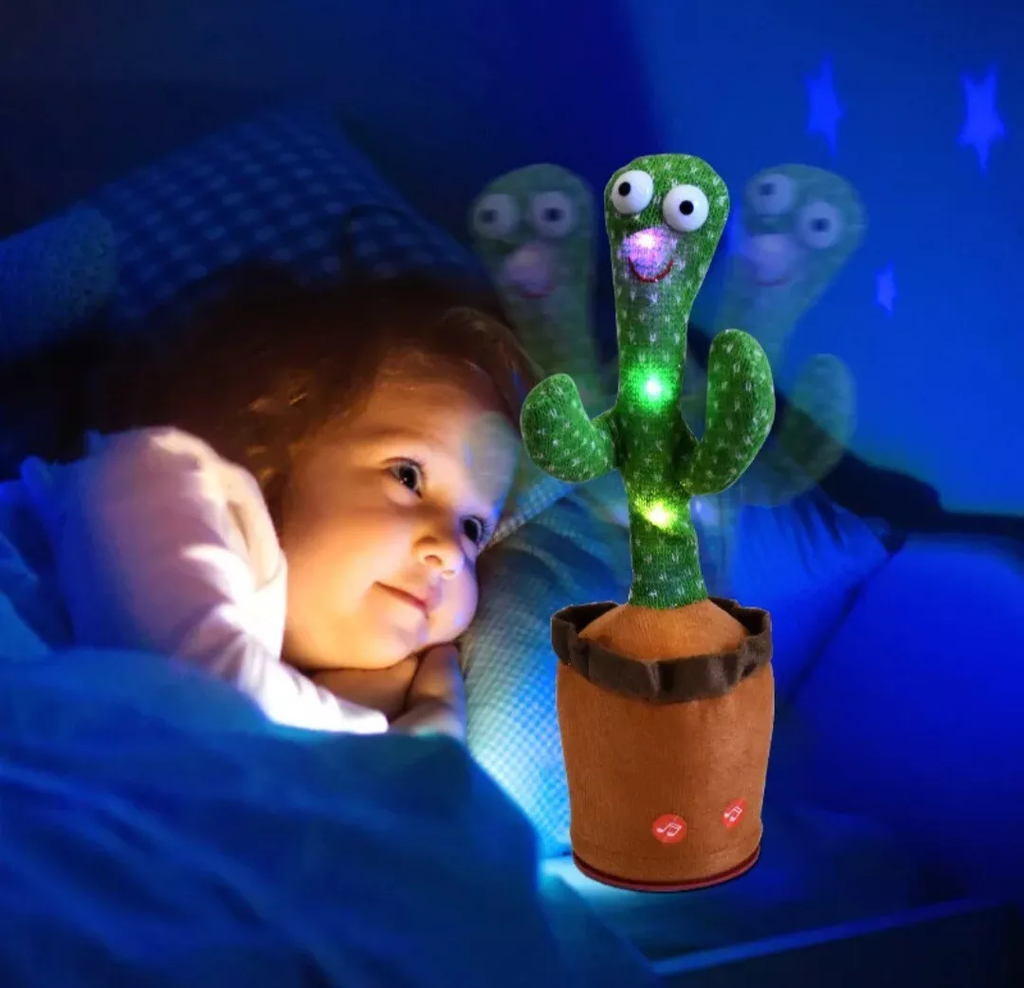 Giocattolo cactus verde con luci LED accese e occhi grandi sul vaso marrone