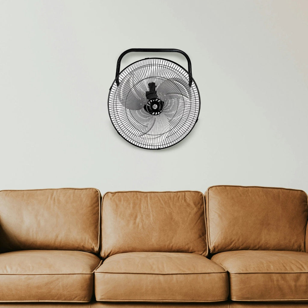 Ventilatore nero a parete con griglia circolare e supporto