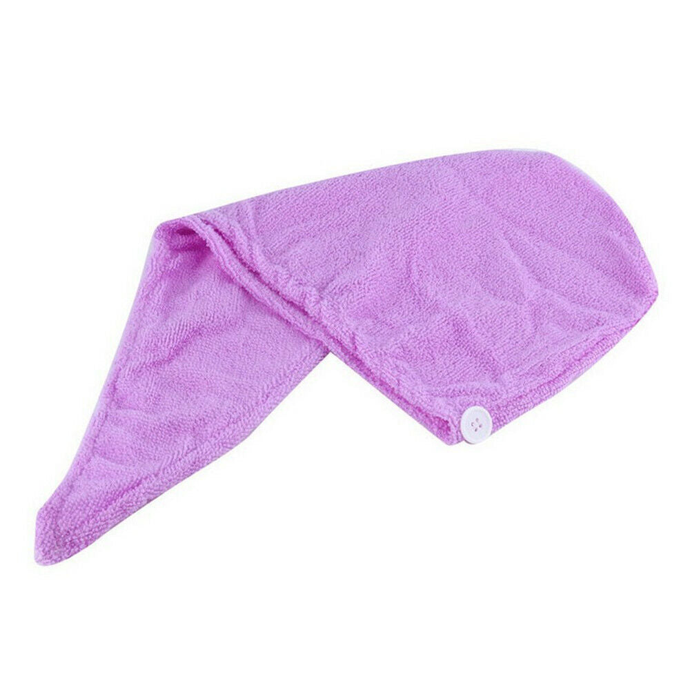 Asciugamano turbante microfibra viola piegato con bottone.