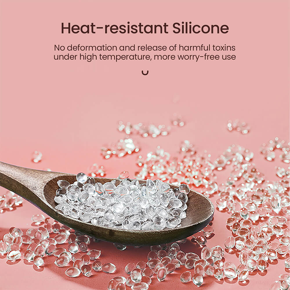 Ciotola in silicone per scaldacera con granuli di cera e cucchiaio.