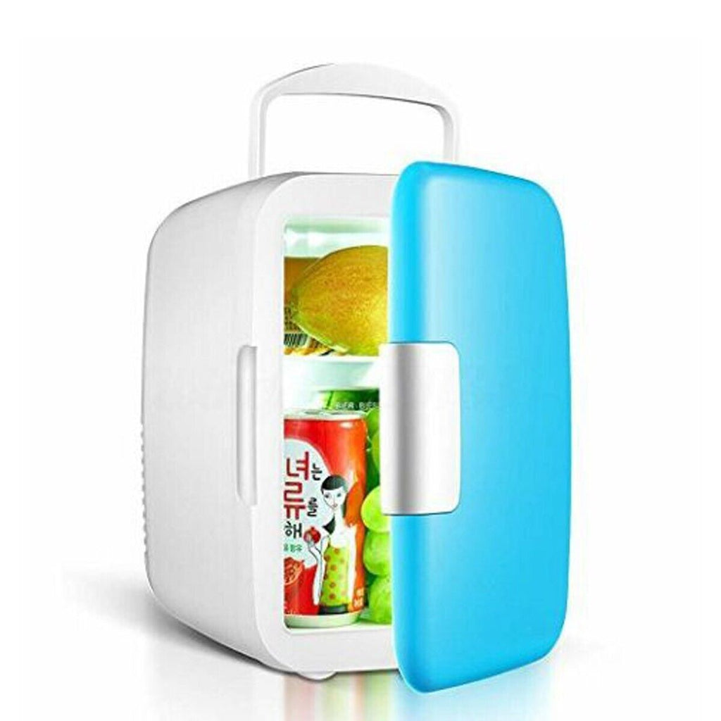 Frigo portatile bianco con coperchio aperto e vano interno con bottiglie e alimenti