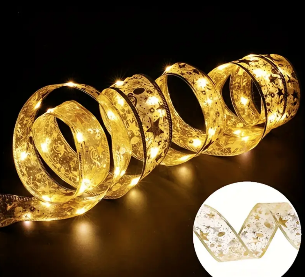 Rotoli di nastro LED dorato con decorazioni e luci calde