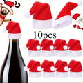 Set di 10 mini cappelli di Babbo Natale rossi con bordo bianco e pon-pon